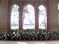 Under the clock tower of main building.